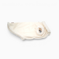 Abrigo de borreguito beige para perros de Bambino Doggies con hebilla en D para correa y cierre de clicks
