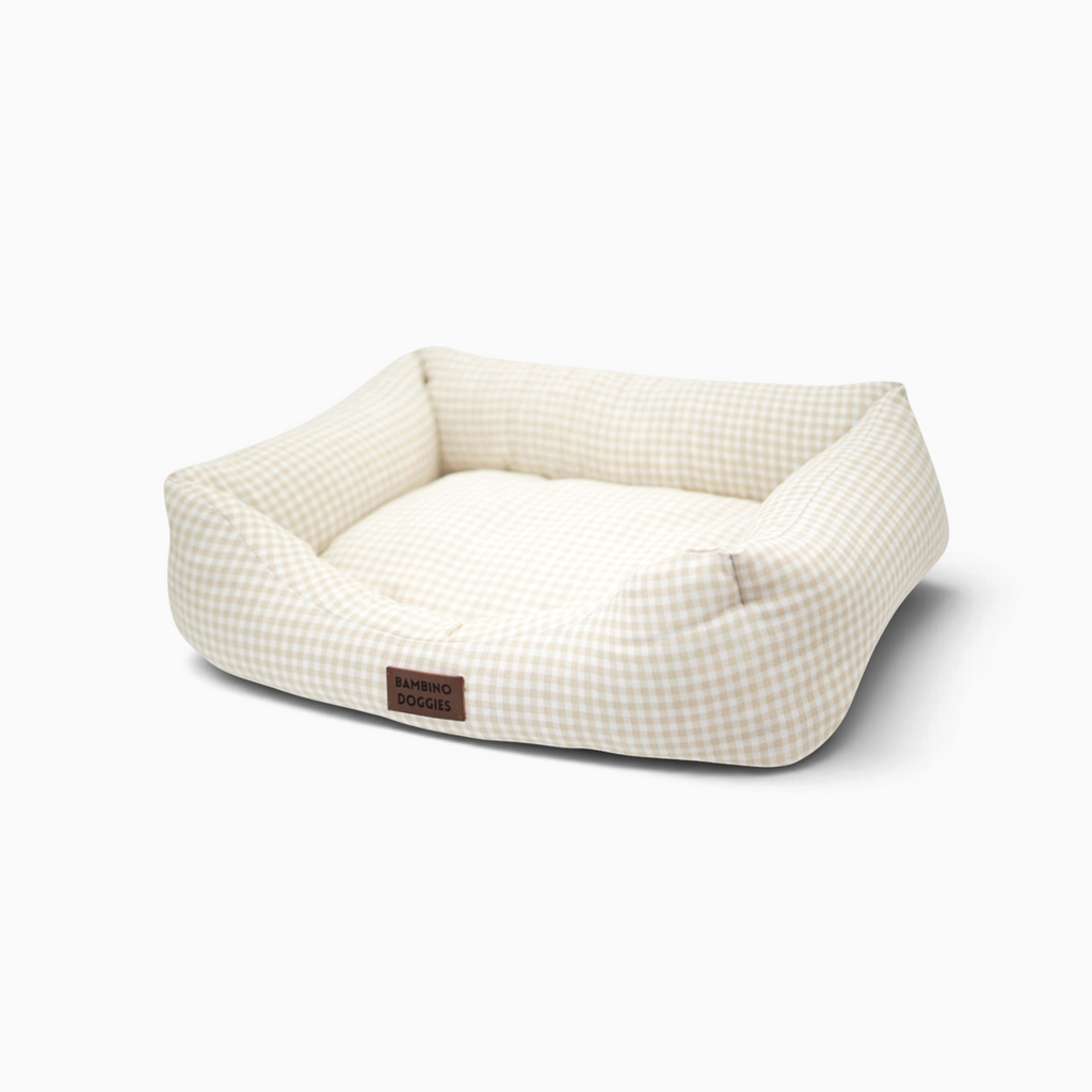 Cama para perros Bambino Doggies con estampado vichy en color beige, diseño acogedor y base antideslizante.