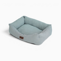 Cama para perros Bambino Doggies con estampado de cuadros vichy en color gris y etiqueta de piel sintética