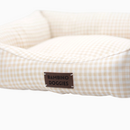 Cama para perros Bambino Doggies de tela vichy beige con etiqueta de piel y base antideslizante